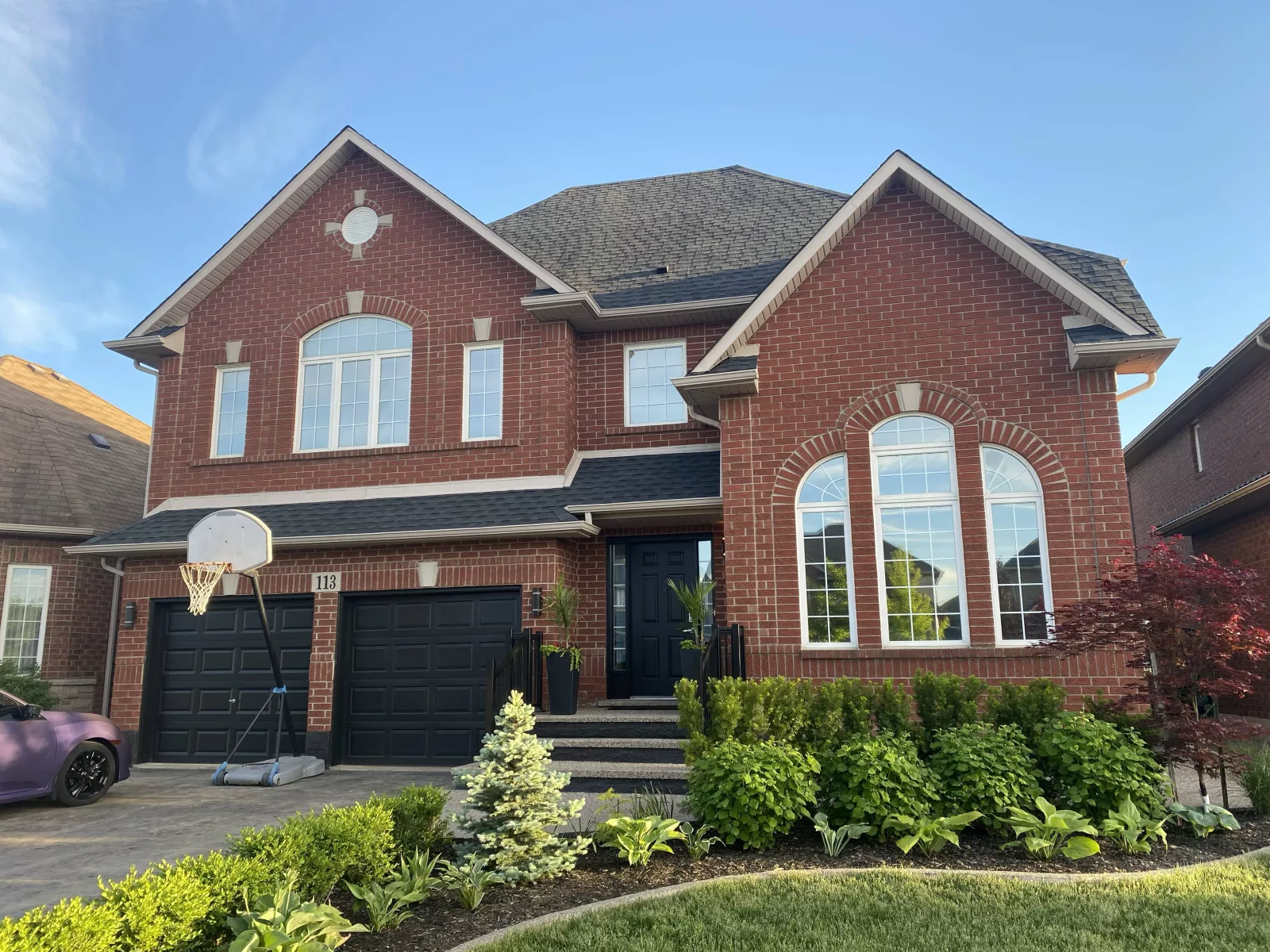 Residential window film installation reducing glare in a Hamilton home
