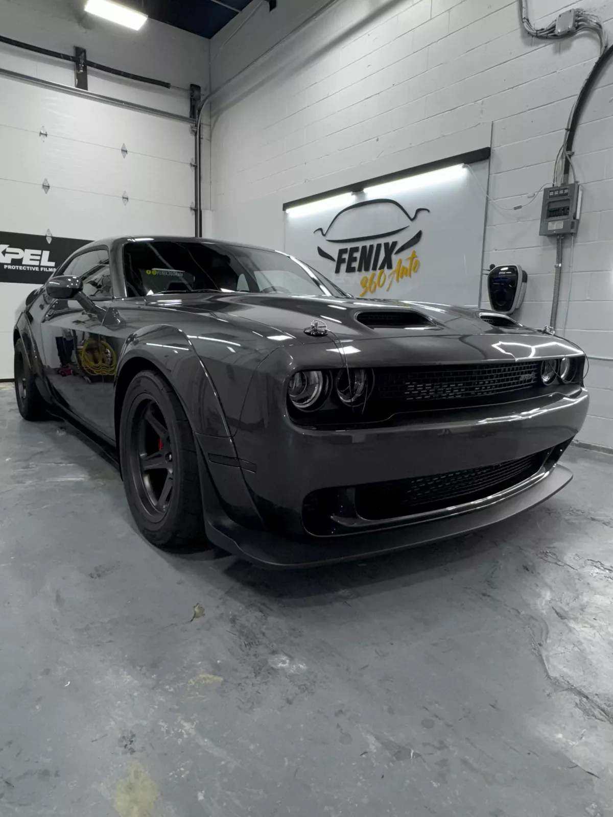 Close-up paint correction and film finish by FENIX 360