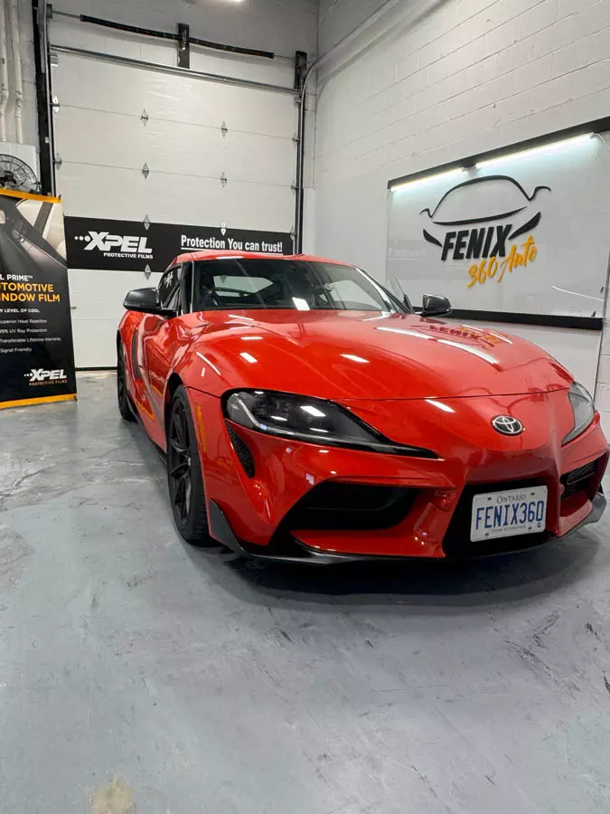 FENIX 360 paint protection film finish on a dark vehicle